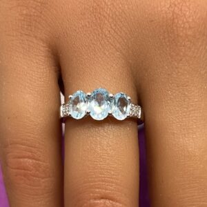 Aquamarine and diamond 9ct white gold trilogy ring