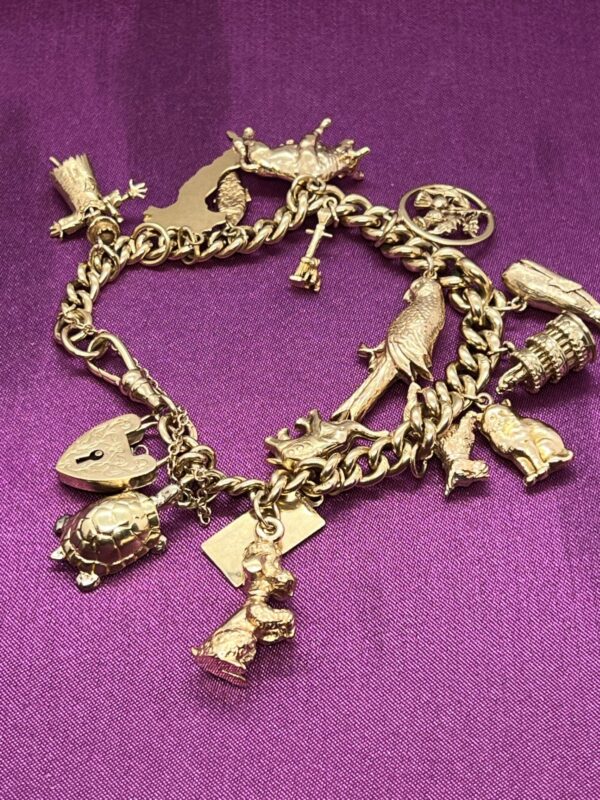 Vintage 9ct gold plus 14 and 18ct gold charm bracelet - Image 4