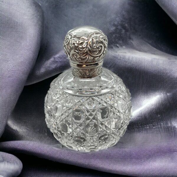 Victorian cut glass silver mounted scent bottle