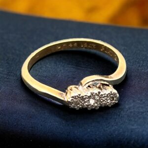 18ct gold diamond set in platinum twist ring