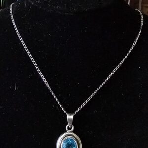 Silver Necklace with oval pendant set with blue stone