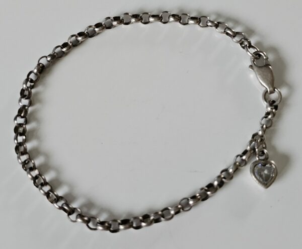 Silver bracelet with small heart charm