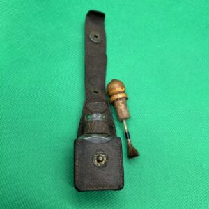 Antique dry fly fluid bottle leather bound