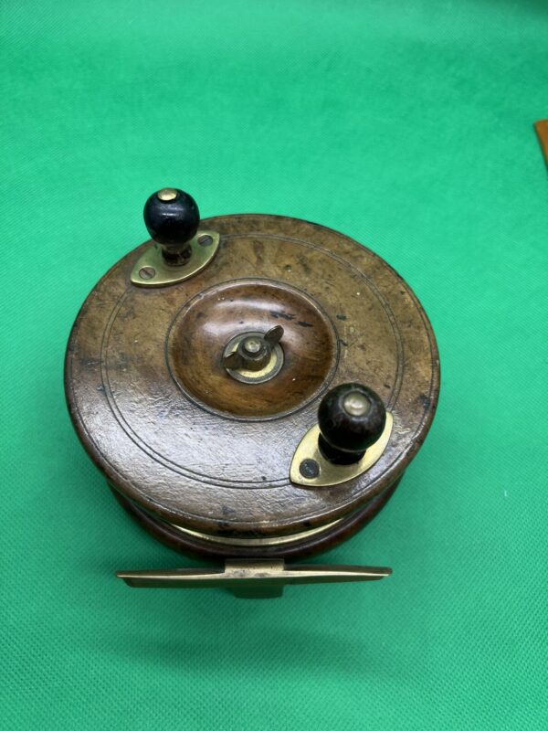19th century sun star back antique fishing reel