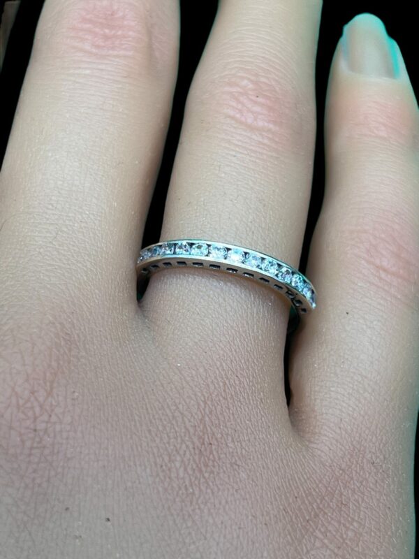18ct white gold and topaz half eternity