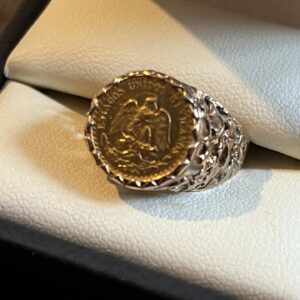 Dos pesos 22ct coin and 9ct mount ring