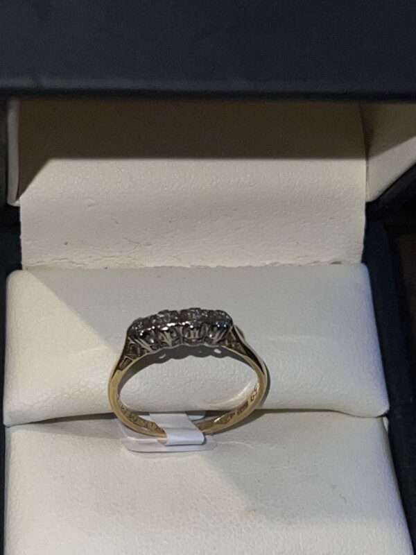 18ct four stone diamond ladies ring