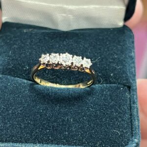18ct gold platinum set five stone diamond ring