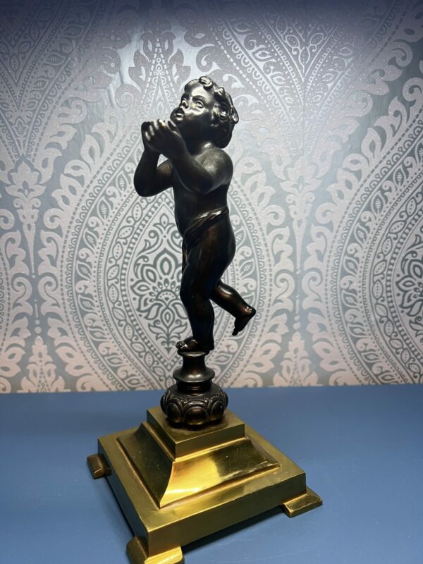 19th century bronze putti figure on brass base