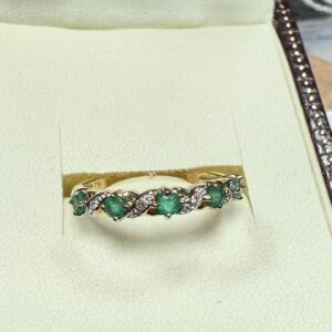 Emerald and diamond half eternity ring 9ct gold