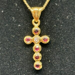 Vintage 18ct gold ruby and diamond set cross