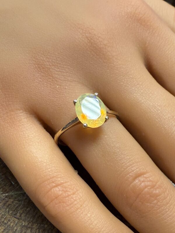 Solitaire Ethiopian opal 9ct gold ring