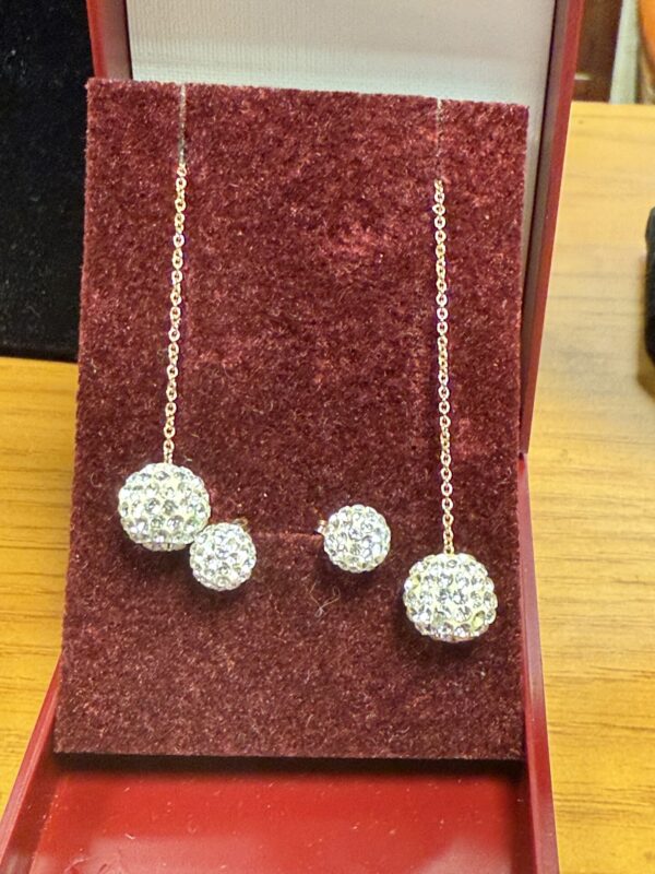 Two pairs of sparkling gem set earrings 9ct gold