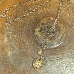 14ct gold egg pendant with 9ct chain