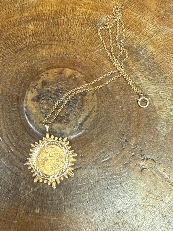 1909 mounted half sovereign pendant and chain