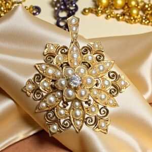 Victorian 18ct gold pearl and diamond snowflake pendant