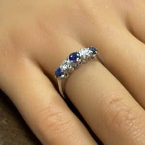Five stone diamond and sapphire platinum ring